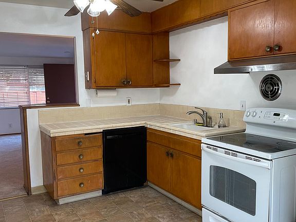 Includes dishwasher, stove, & refrigerator