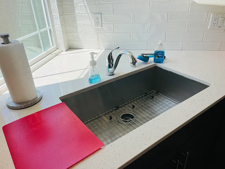 X-Large Stainless Steel sink with pull out faucet are a must for cooking & cleanup.
