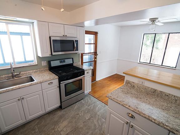 Open kitchen layout leading into dining room