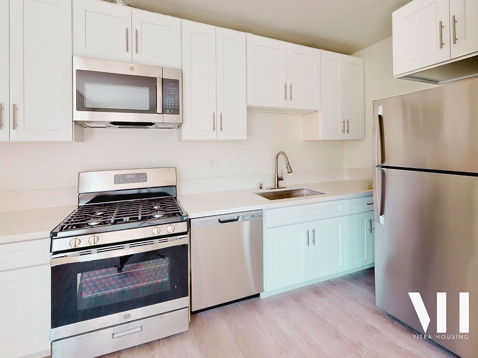 Apt 205 | One Bedroom | Fully Remodeled Interior, Hardwood throughout, Custom kitchen, stainless appliances, gas range, full size refrigerator, great floor plan!