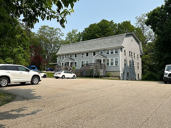 Tree lined lot with plenty of parking and yard space