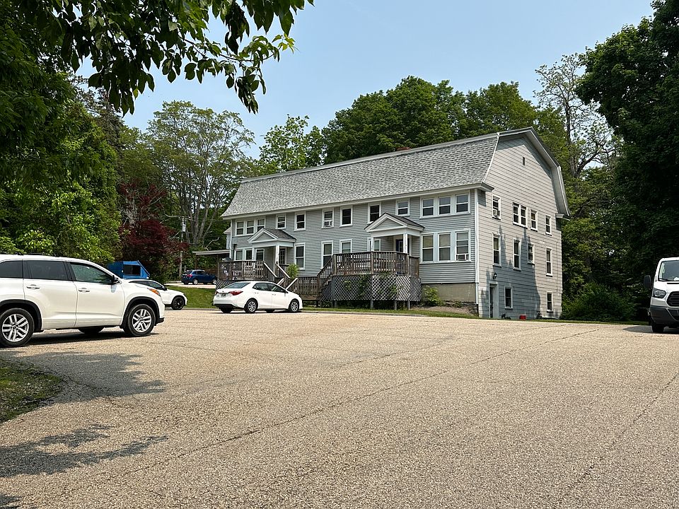 Tree lined lot with plenty of parking and yard space