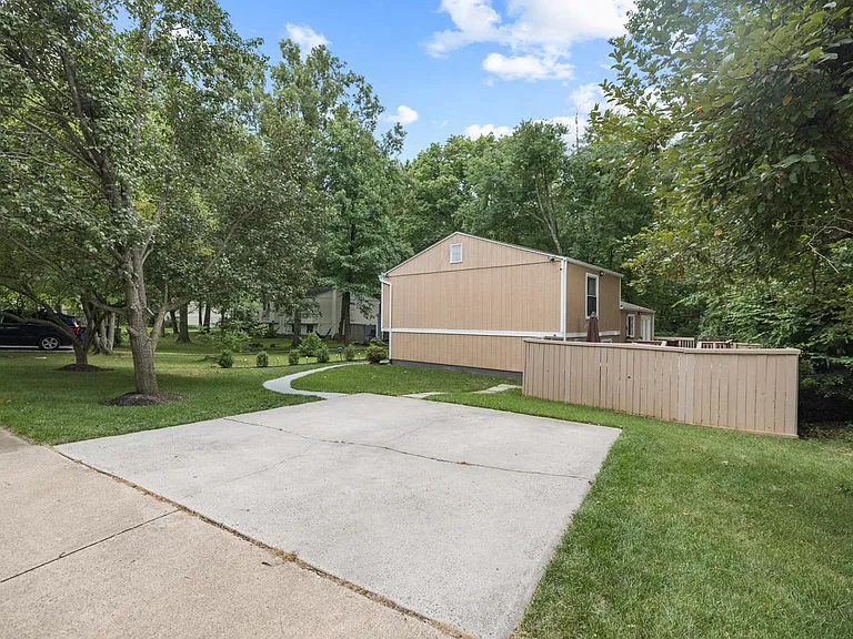 2 car driveway with access to front door and back patio