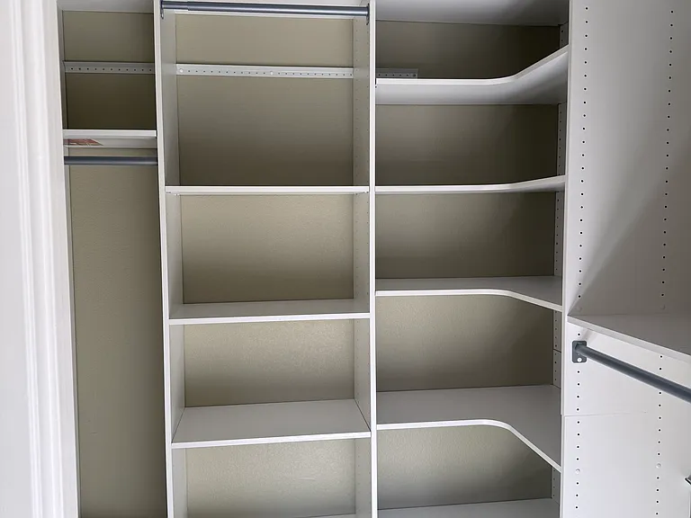 Custom closet in main bed room.