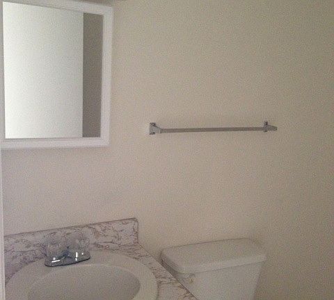 Half bathroom and laundry downstairs