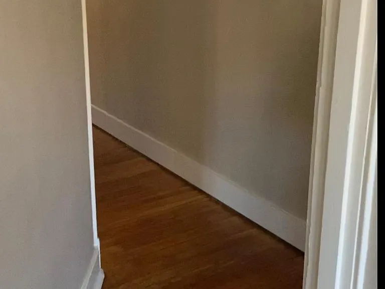 Hallway from Living room to bedroom and other rooms in the apartment.