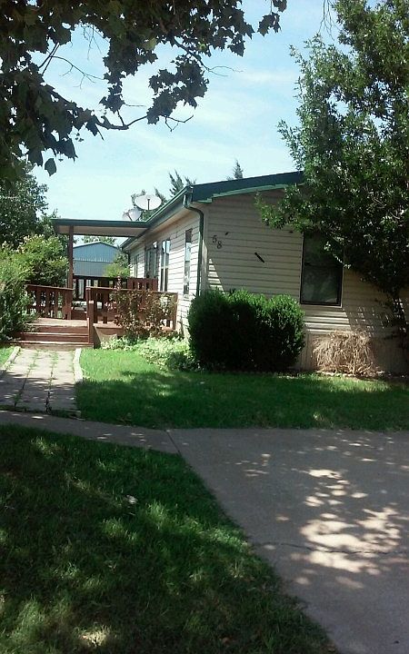 2nd image of 601 NE Flower Mound Rd Lot 58