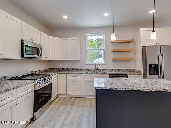 4th image of 8713 Barnacle Blvd