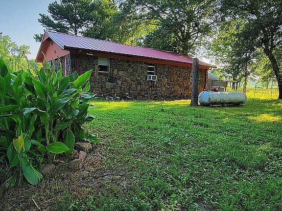 Back of house and propane tank