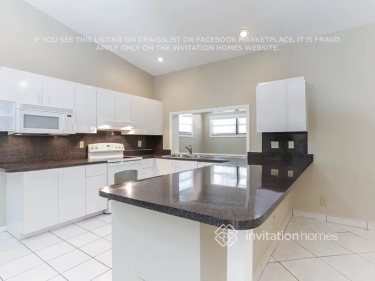 9575 NW 25th Ct — Photo 8