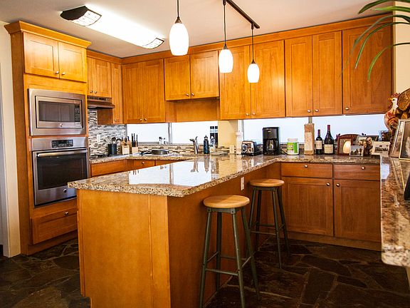 Remodeled kitchen with granite counter tops & stainless appl