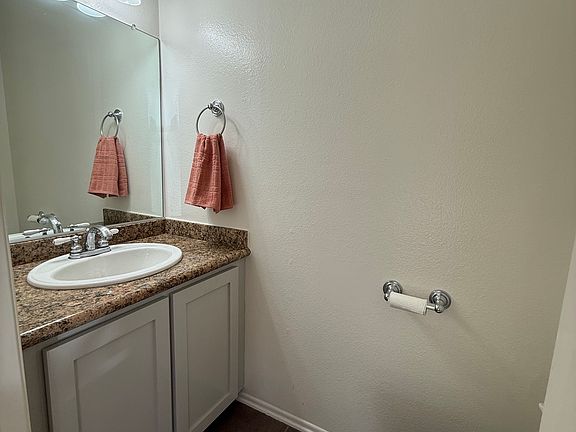 Powder room with granite counter top