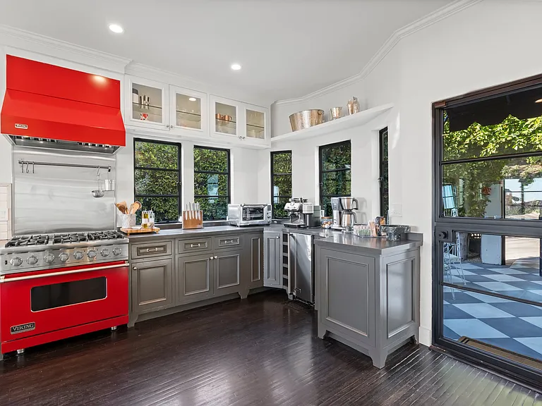 A fully stocked kitchen with high-end Viking appliances and sleek custom cabinetry.