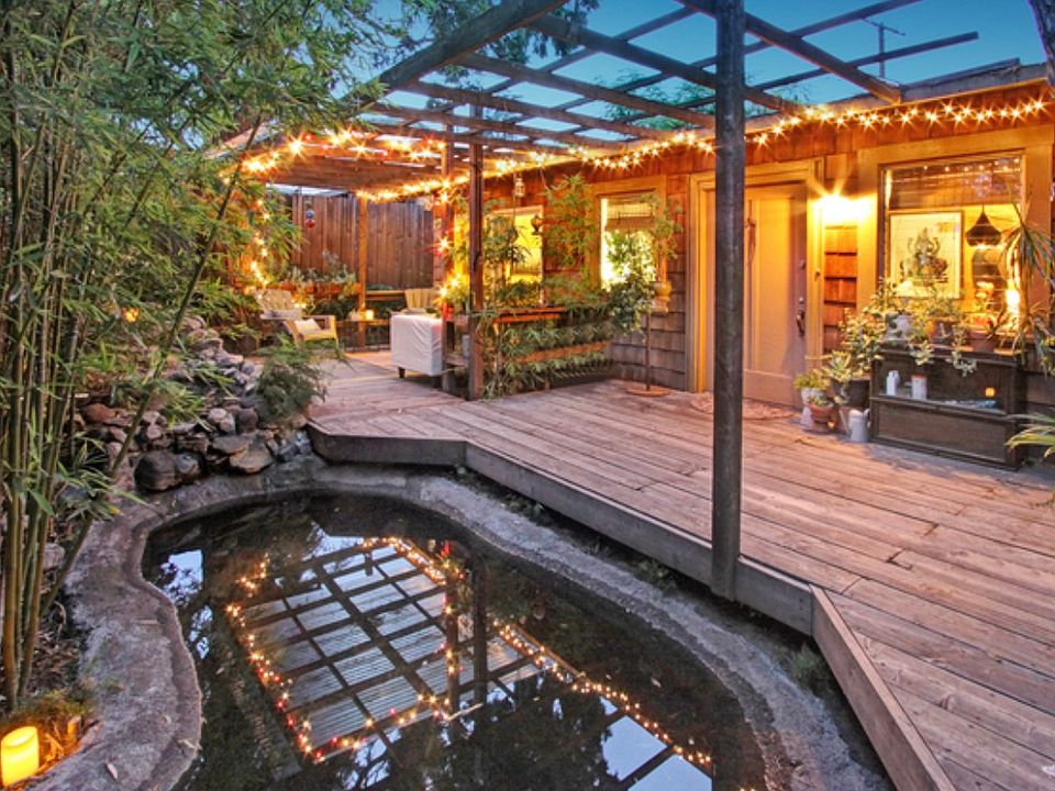 Front entry, deck, and koi pond