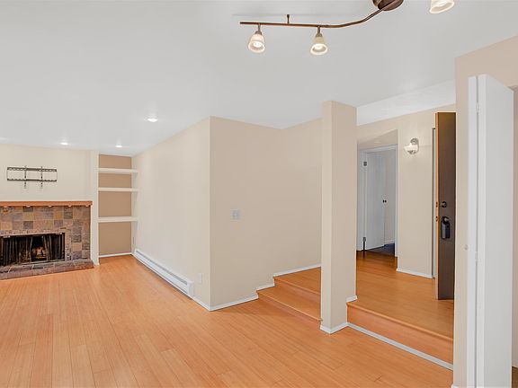 Living room with view of front door leading to the bedrooms