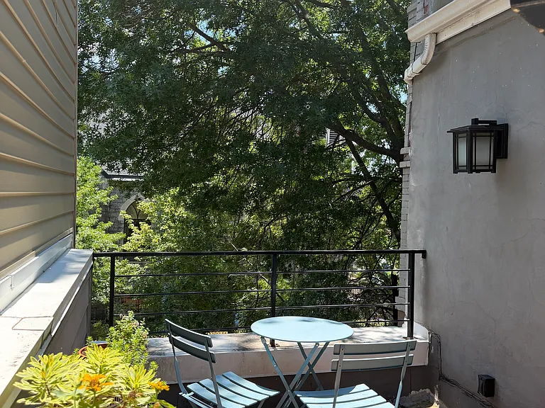 Second bedroom opens out onto leafy terrace