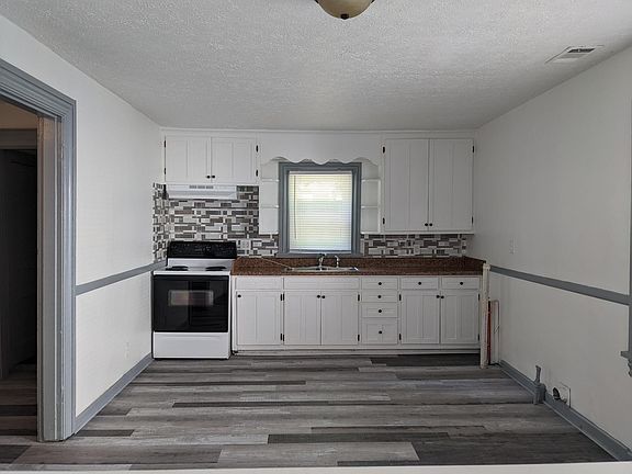 Kitchen from Living Room. Refrigerator will be provided.