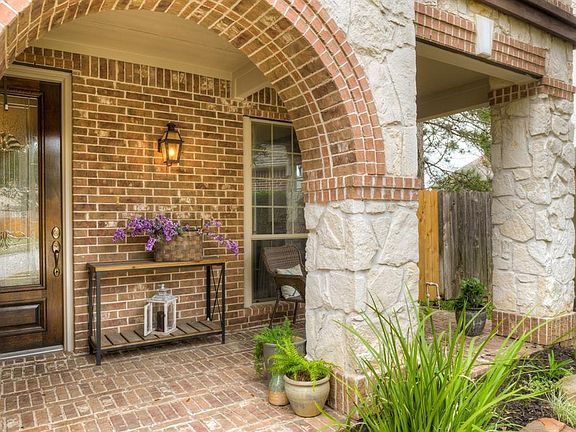 Mint condition with oversized rooms, high ceilings, abundant glasswork, and architectural details throughout;