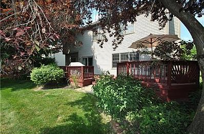 Mature trees and shrubs make this back yard just a pleasure to enjoy.