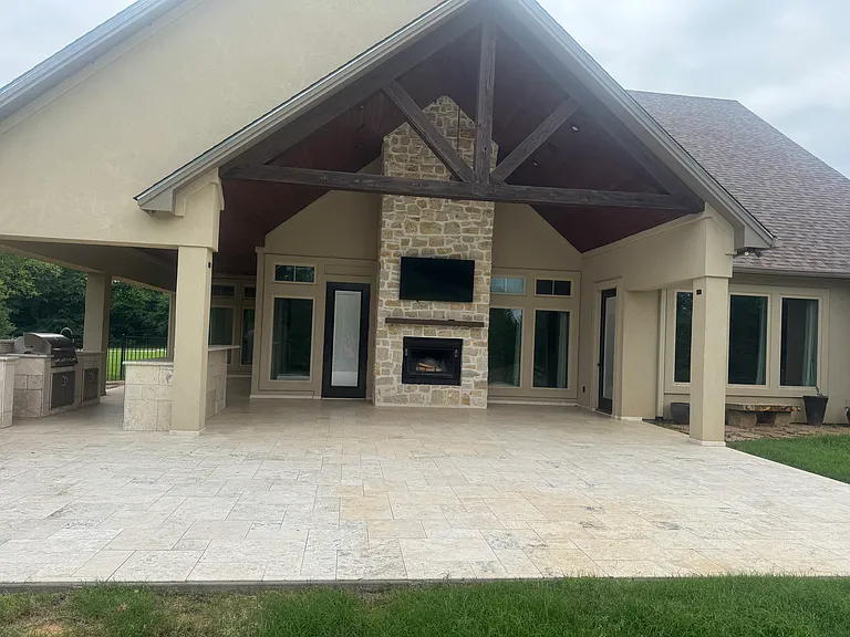Outdoor living space; fireplace with extended patio