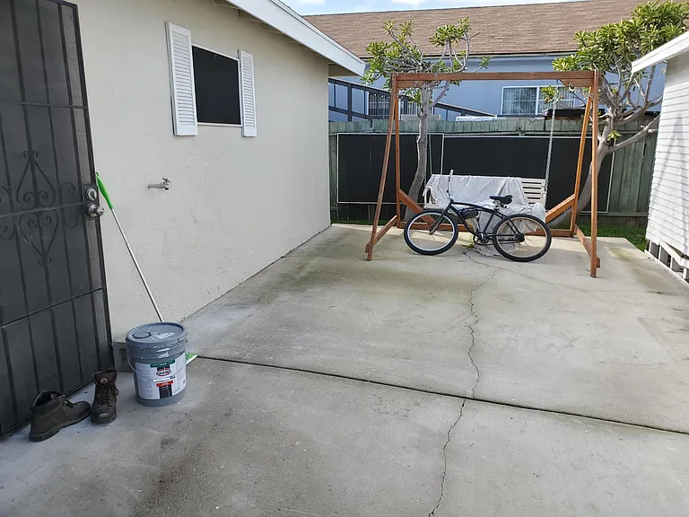 Patio between house and garage.