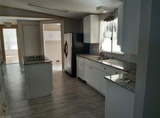 32 Island Lake Ln, Naples, FL 34114