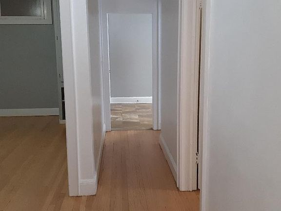 looking down to kitchen from entryway