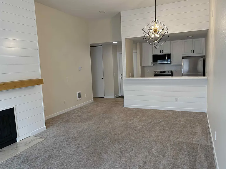 Main living area, dining area and entry with 10ft high ceiling for extra spacious feeling.