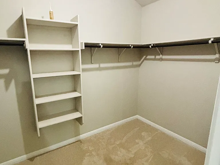 Walk-in Closet (Master Bedroom)