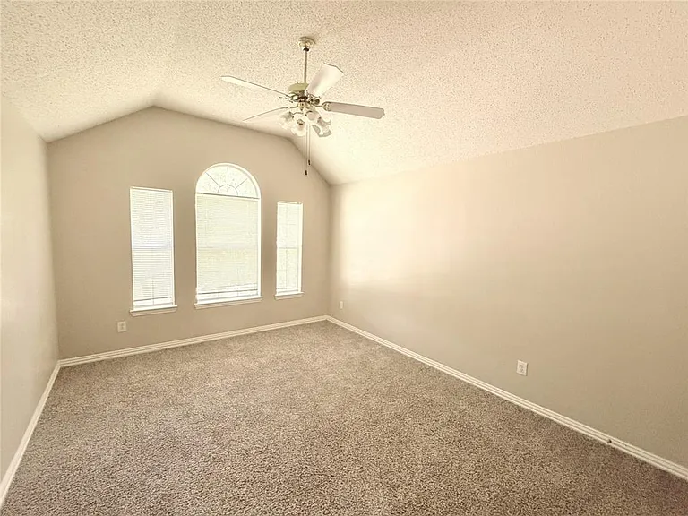 ONE OF 4 BEDROOMS LOCATED UPSTAIRS