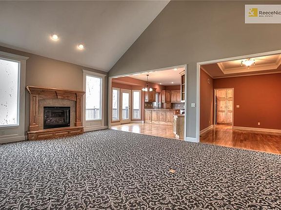 Great room with fireplace and vaulted ceiling