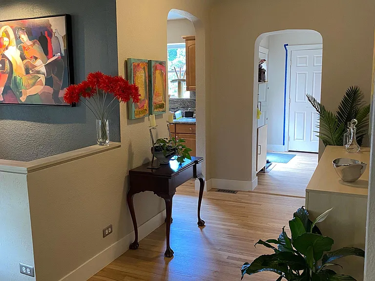 Hallway looking to back doors that lead to deck.