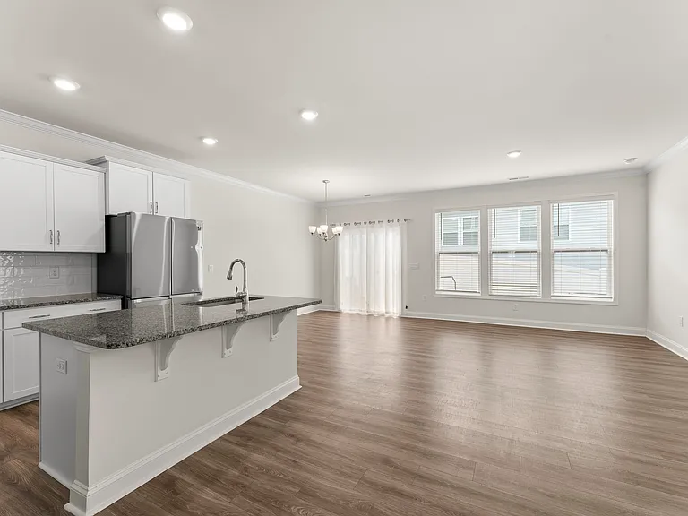 open concept floor plan with ample room for living and dining room
