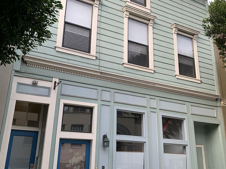 Building front. Four upper windows are apartment A.