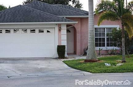 Front View
						:
						The house has a recessed front door.