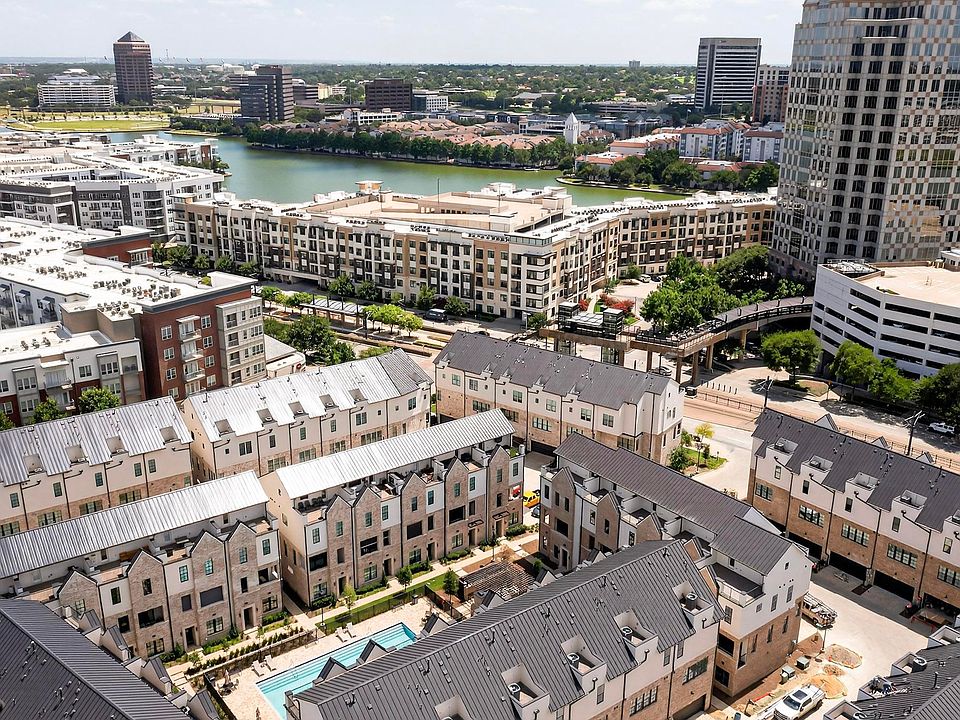 Bird's eye view of community facing Lake Carolyn. Access the Dart Rail to Downtown Dallas, Victory Park or DFW Airport, just seconds away from front doorstep.