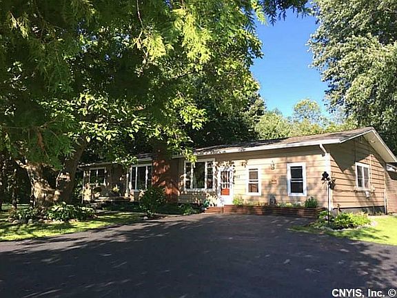 Exterior Front. Updated Ranch Home- "country, but close". New roof, new windows, extra wide driveway w/parking area.