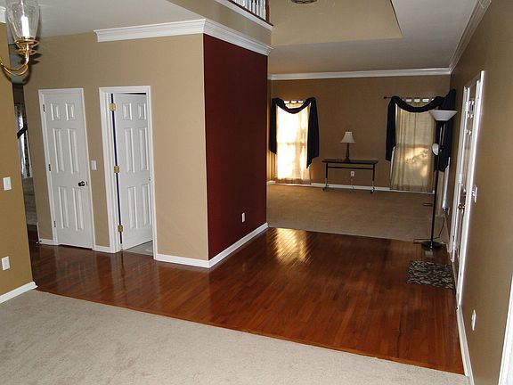 Formal Dining Room looking across foyer into formal living room