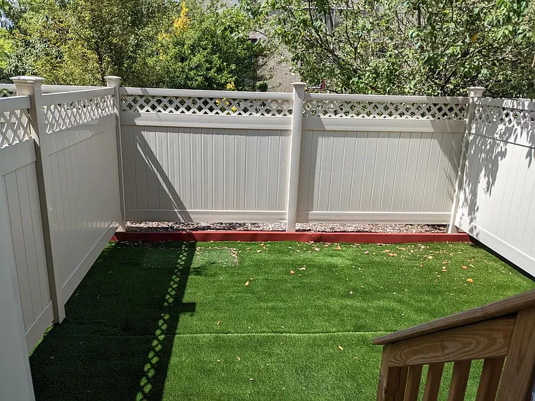 Looking Into Private Fenced Backyard From Apt