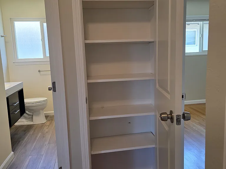 Linen closet just outside of the bathroom.
