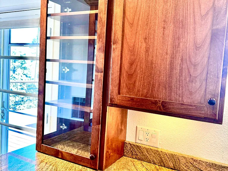 Custom glass inserts and undercounter accent lighting