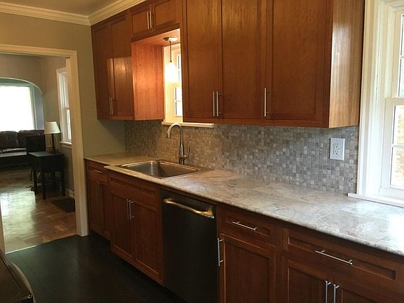 Kitchen with cherry cabinets