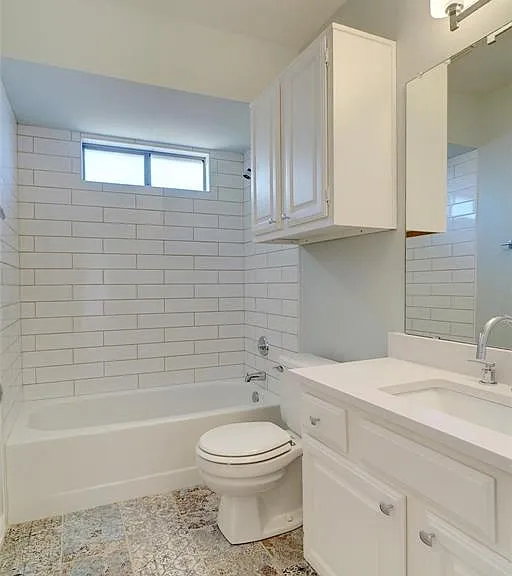 Hall Bathroom - Quartz Countertops, Stainless Plumbing Fixtures, Decorator Tile