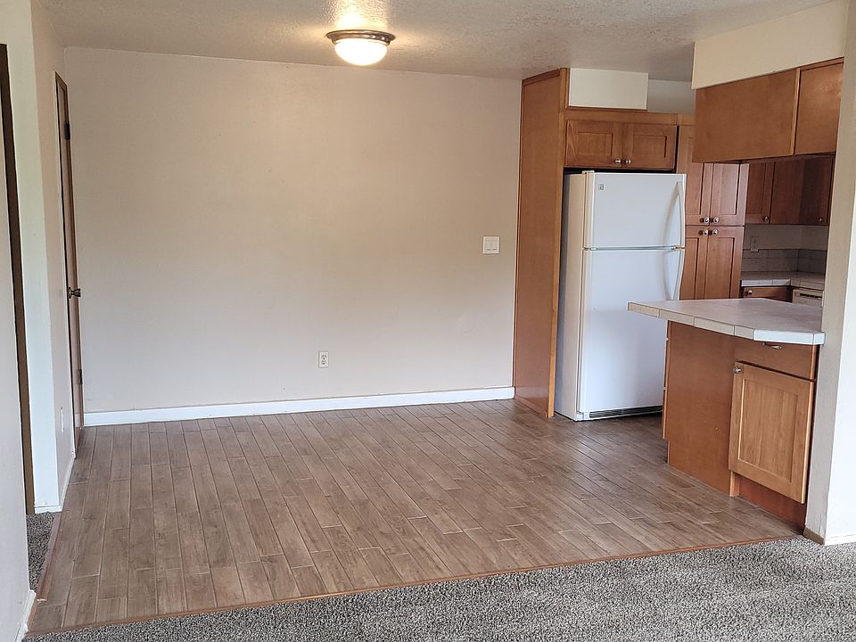 dining room, coat closet and kitchen