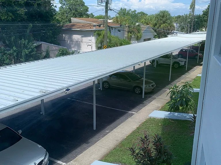Covered carport parking spaces in back of unit. Space #9 is your reserved parking space.