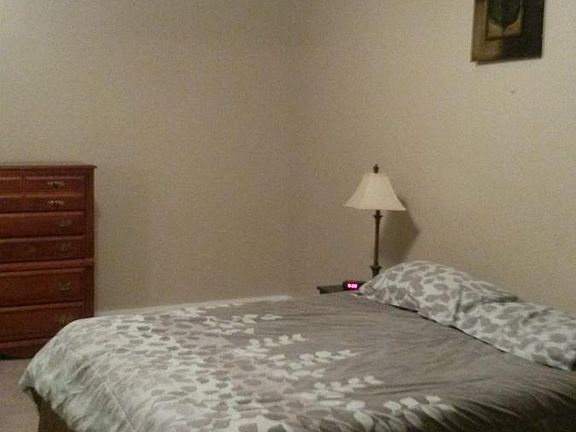 spacious bedroom with walk in closet