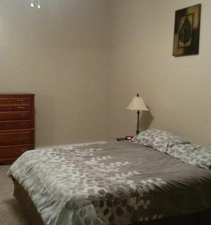 spacious bedroom with walk in closet