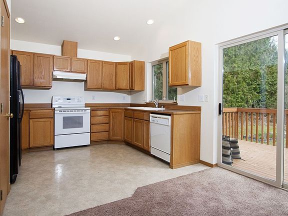 Kitchen with slider to balcony