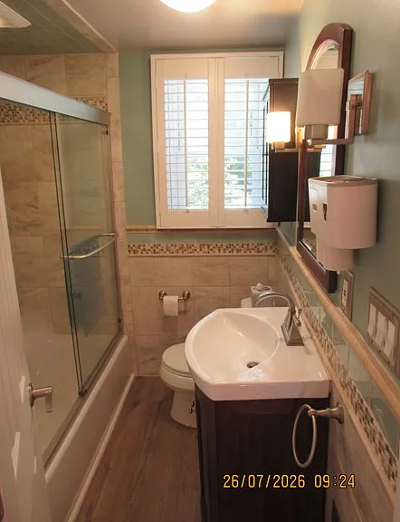 upper bathroom with shower and tub