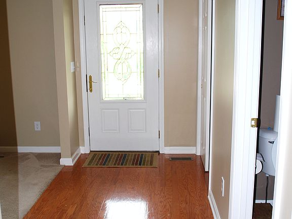 Entry with wood floors